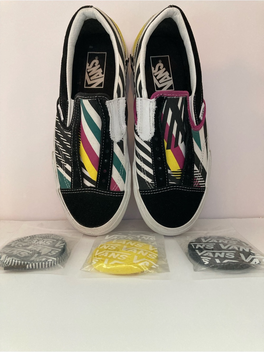 Vans “Off the Wall” slip-on with laces.